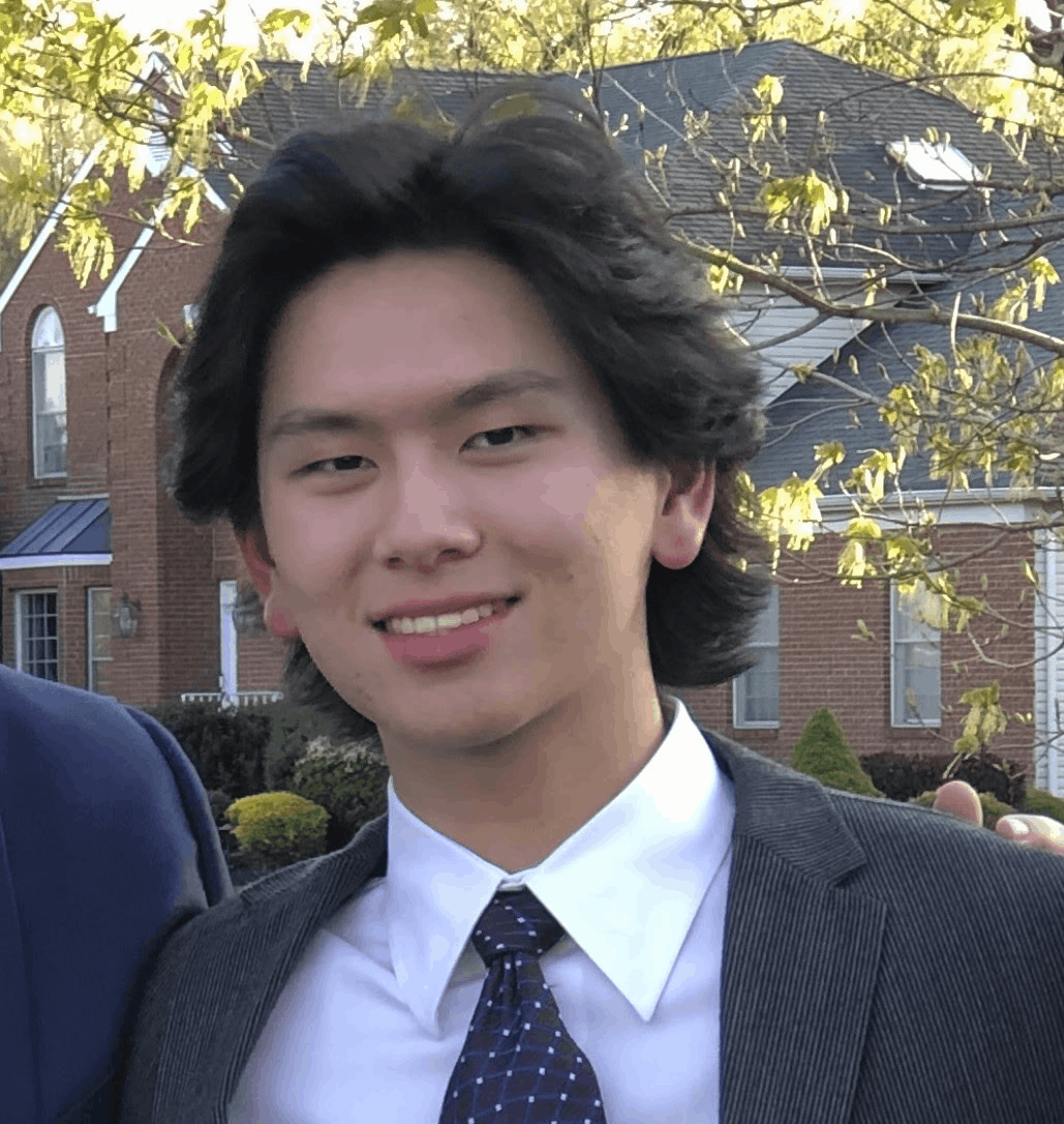 A professional image of Jeremy Hu smiling.